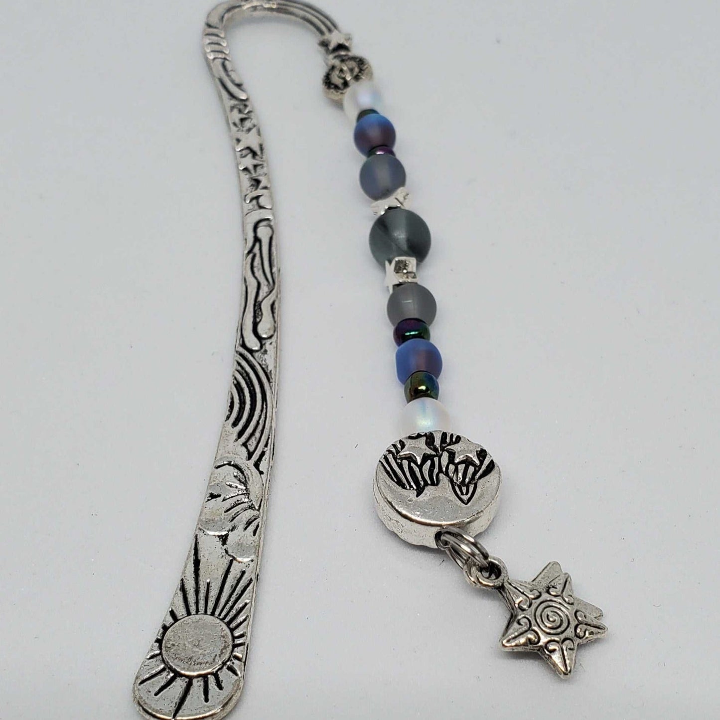 Celestial Bookmark with gray and purple aura glass beads, pewter star accents, and a dangling star charm