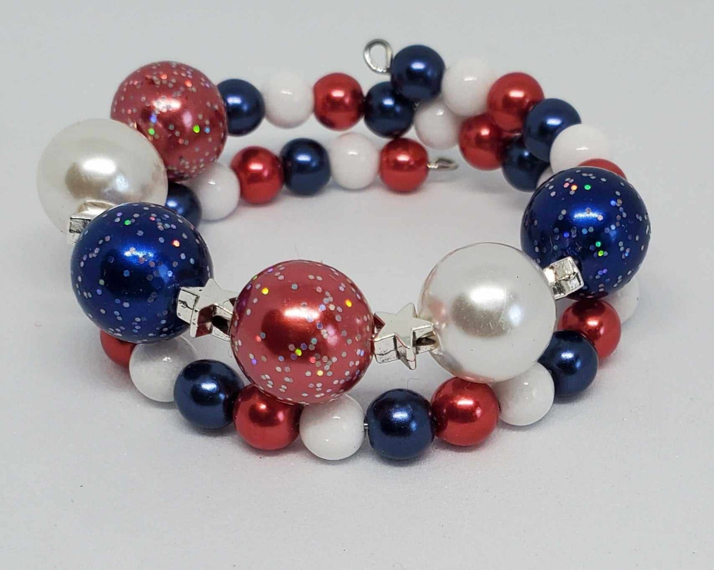Star Spangled Cuff Bracelet for children with red, white, and blue beads and silver star spacers for 4th of July celebration