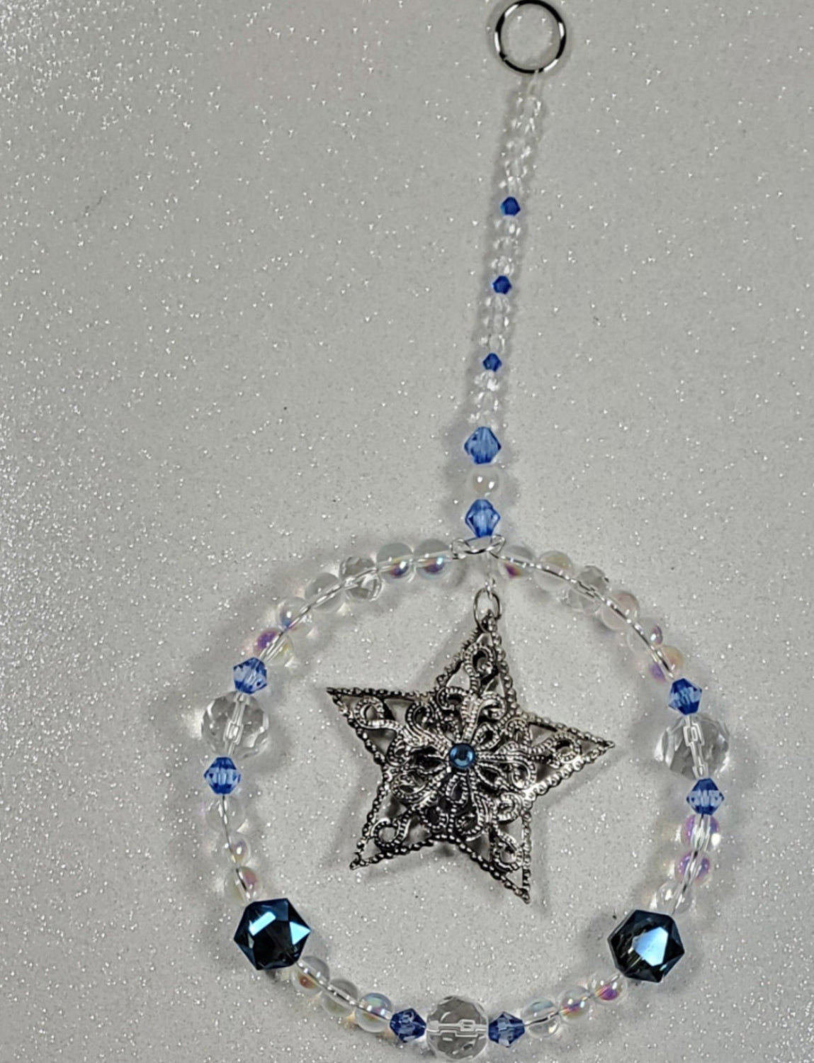 Holiday Ornament filigree star suncatcher with clear and blue glass beads hanging decoration