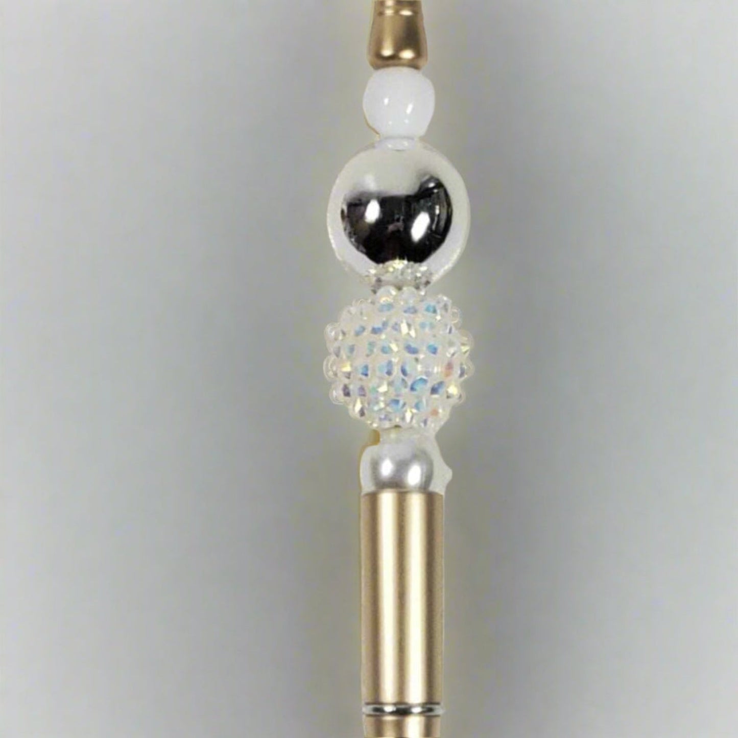 Festive decorative pen with acrylic beads and gold body for holiday decor and gifting