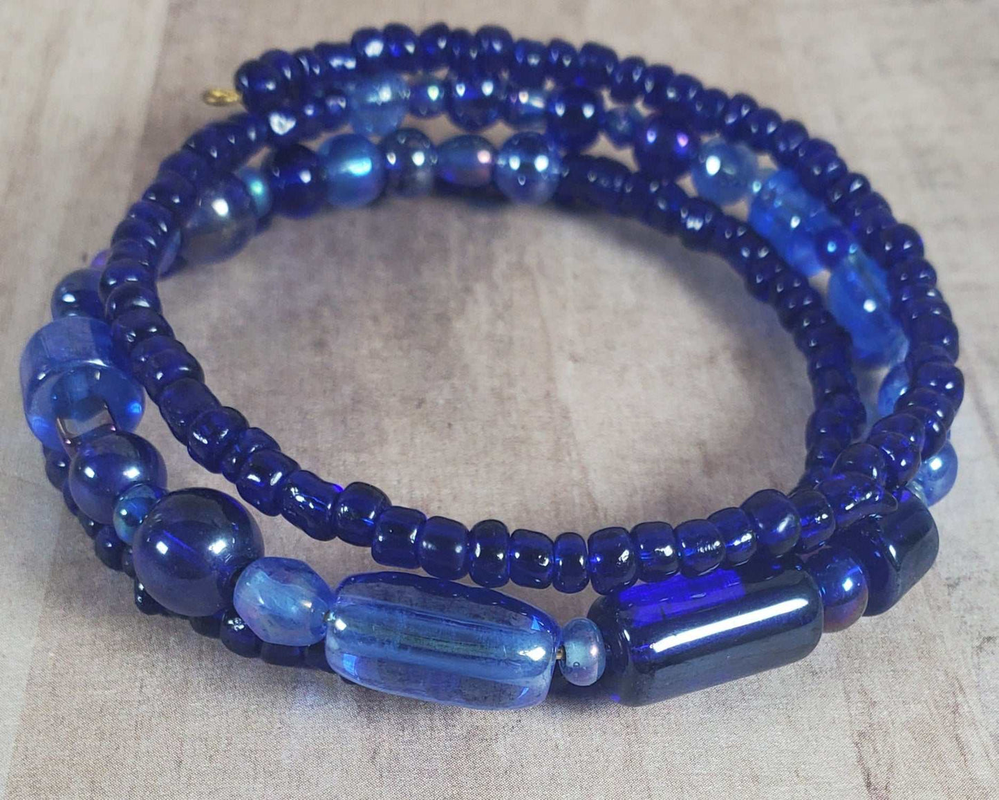 Boho Iris Blue cuff bracelet with handmade blue glass beads and adjustable memory wire design