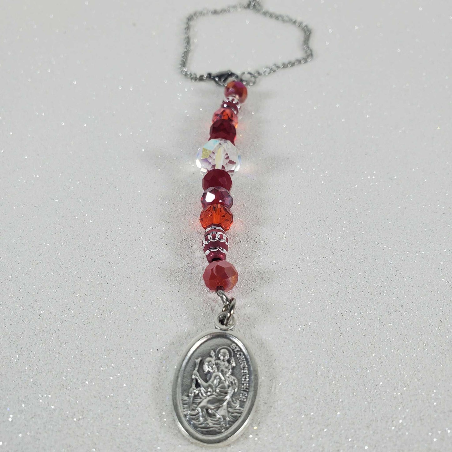 Rearview mirror car charm with pewter St Christopher medallion and red glass beads hanging 8 inches