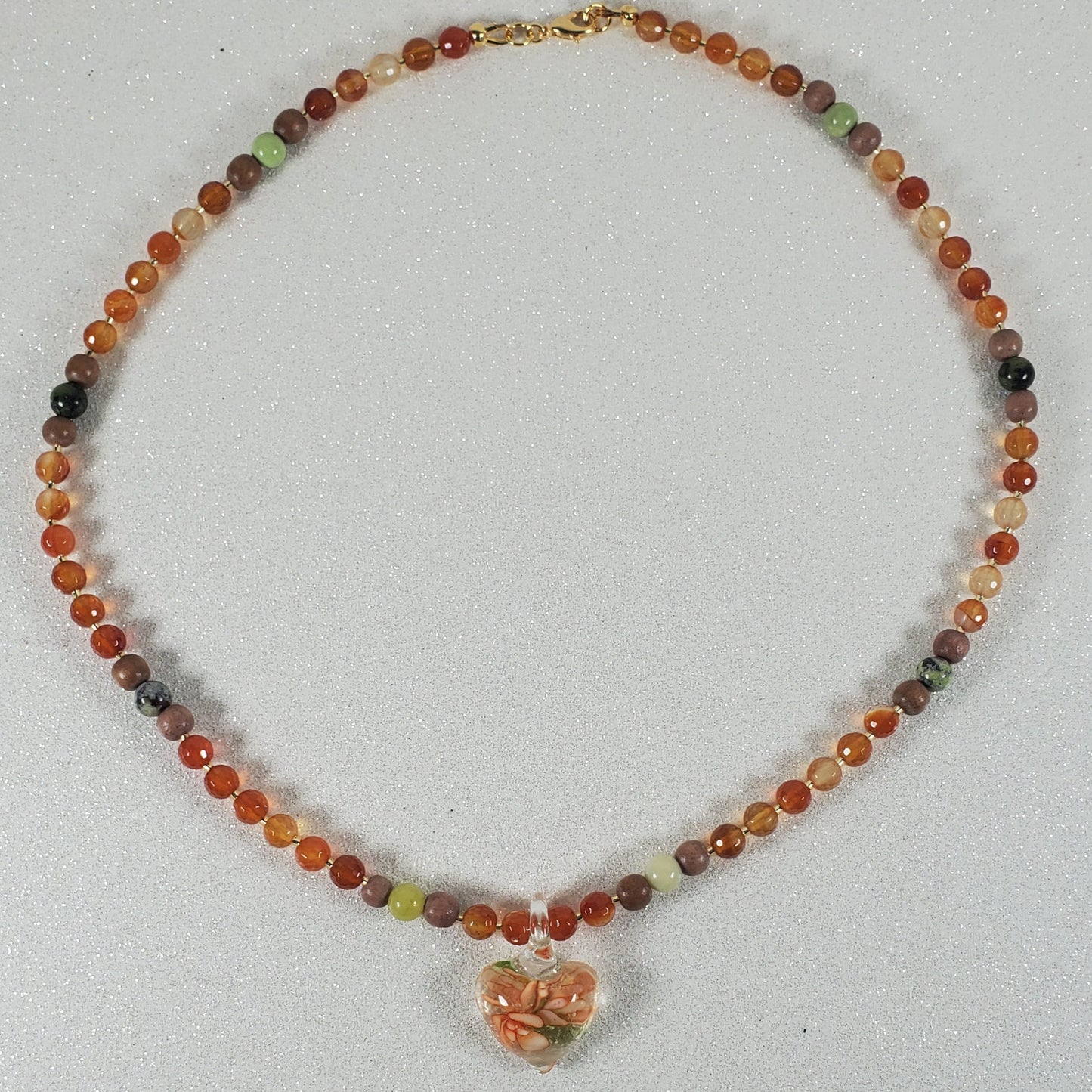 Beaded necklace on a white surface