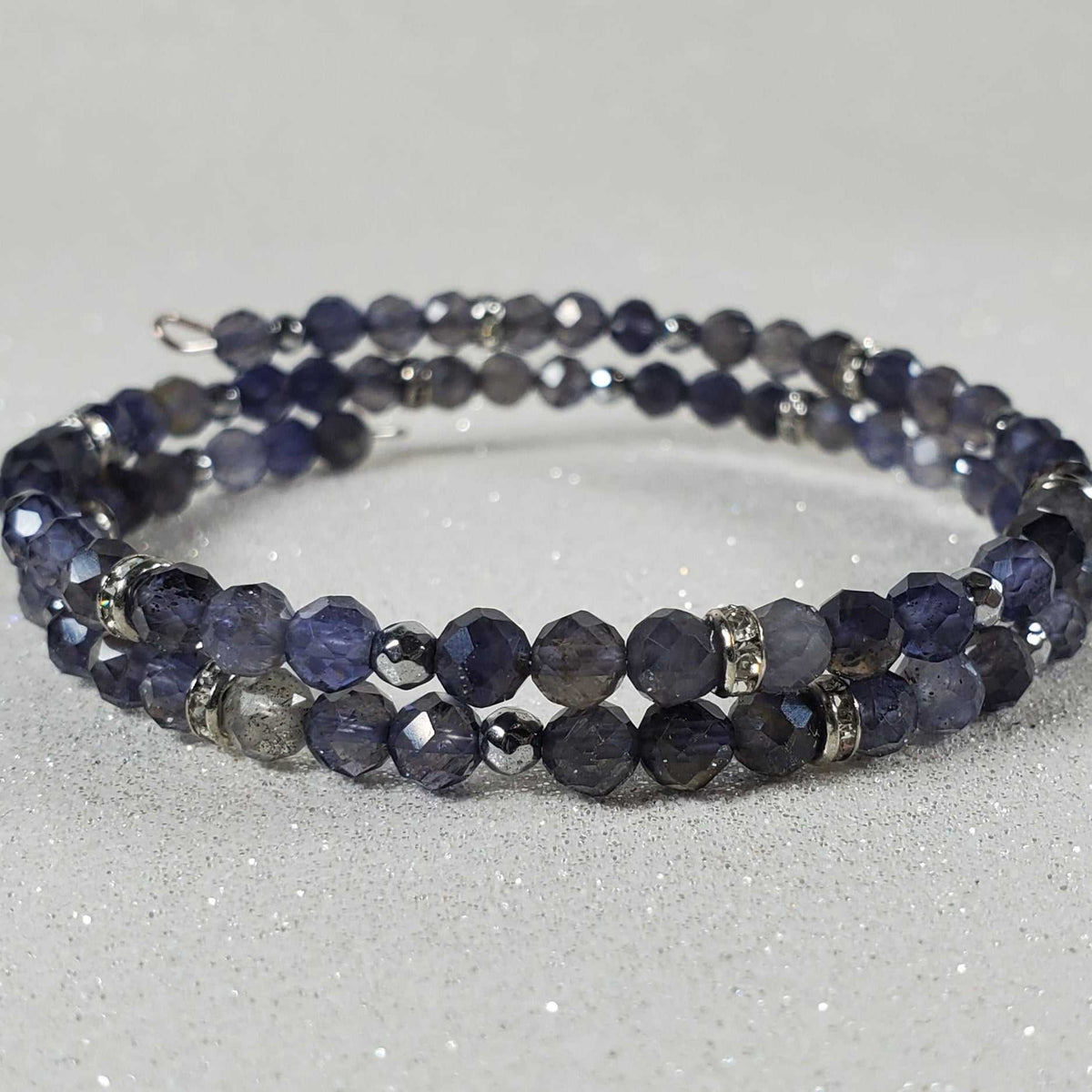 Gemstone Bracelet: Iolite Cuff with deep blue and smoky gray faceted beads, silver-tone accents, and a double-row design.