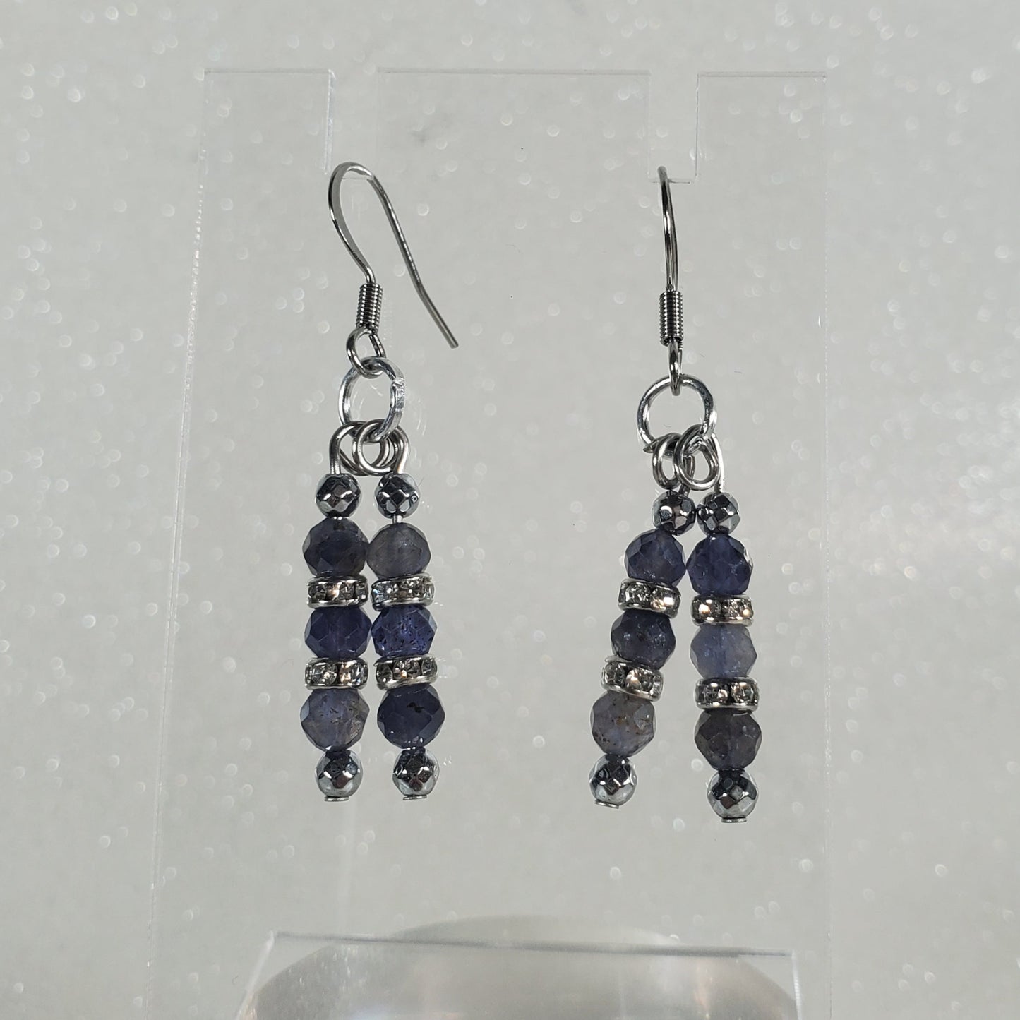 Pair of beaded earrings on a white background