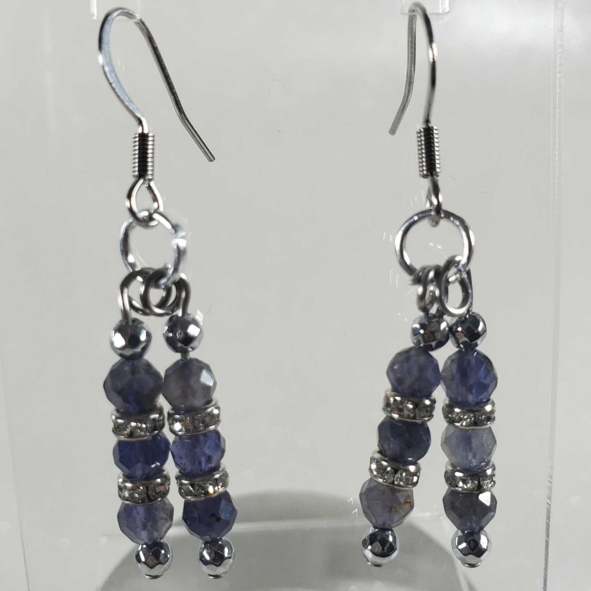 Gemstone Earrings: Iolite, blue-violet faceted beads with silver-tone rhinestone spacers and French wire hooks.