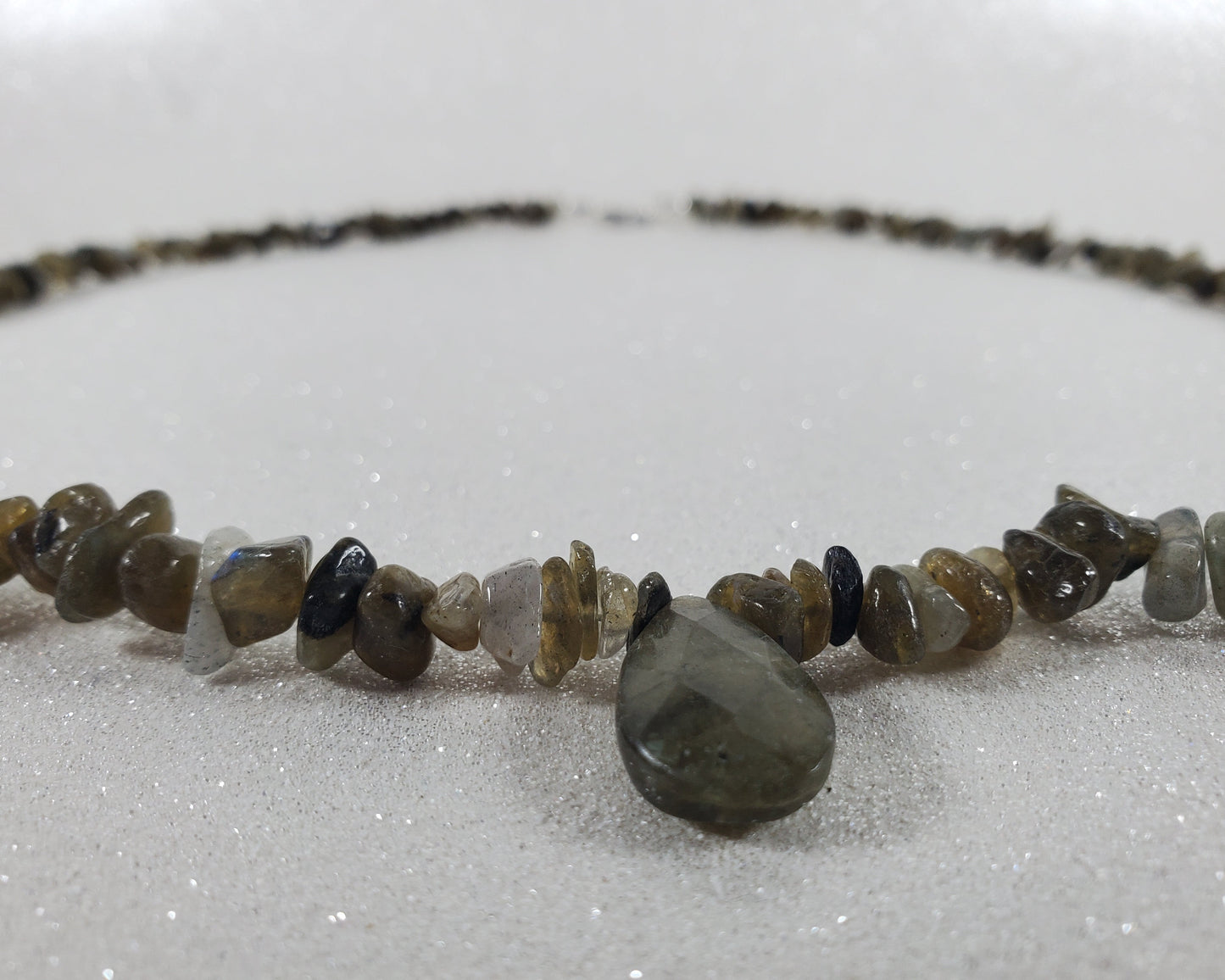 Necklace with stone beads on a white background