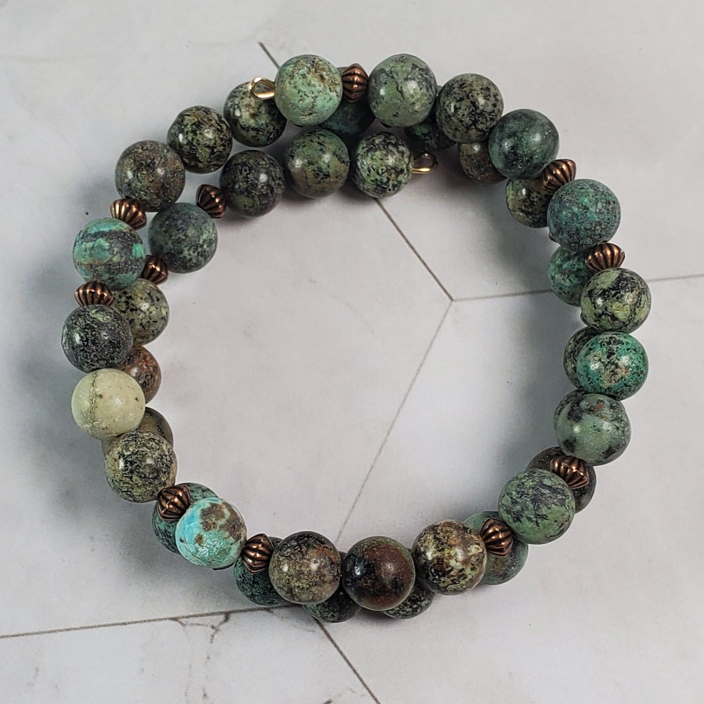Beaded bracelet on a marble surface