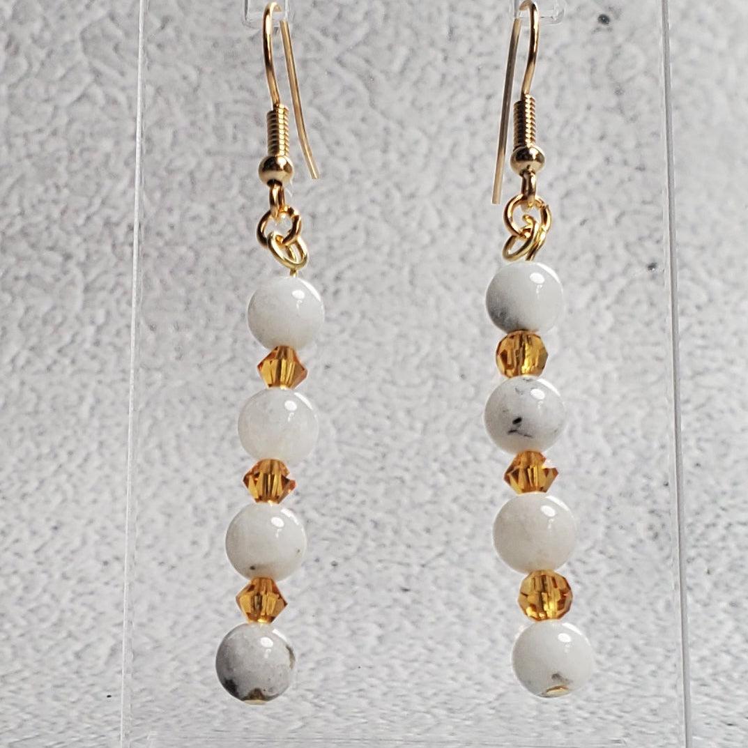 Moonstone and crystal gemstone earrings with French wire hooks for versatile, elegant wear
