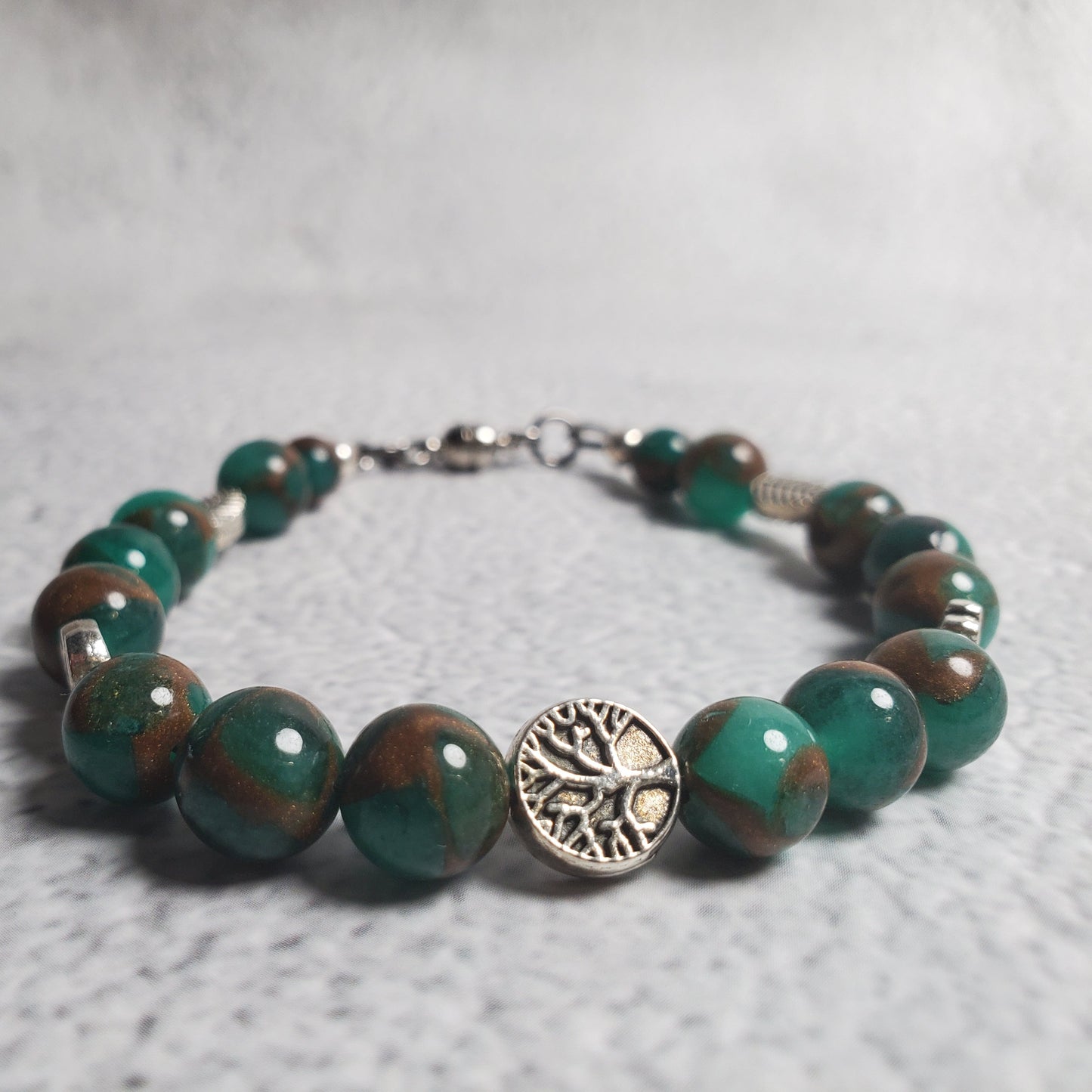Handcrafted gemstone bracelet with green resin sponge quartz and Tree of Life pewter beads in rustic Celtic design