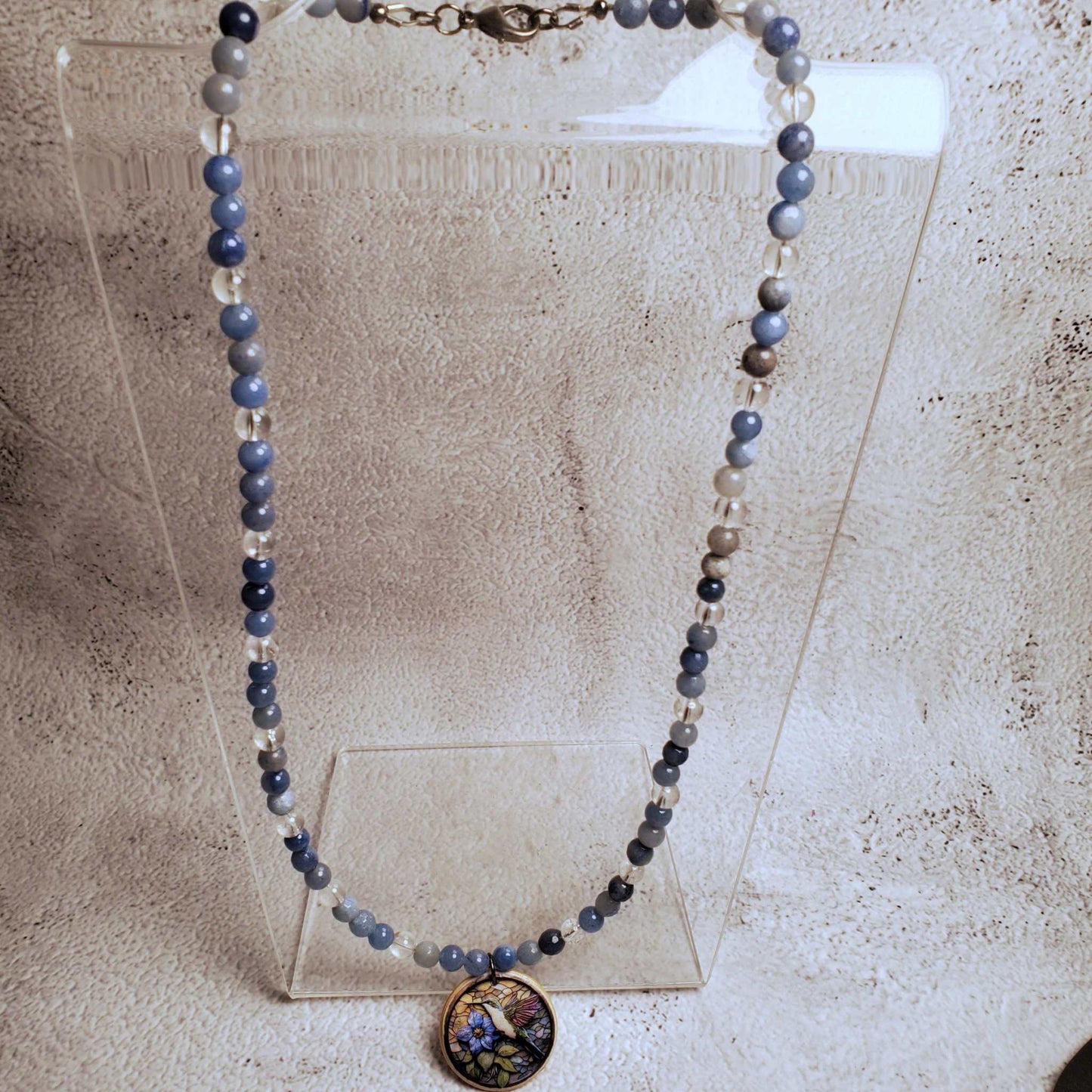 Handcrafted Blue Aventurine and Clear Quartz necklace with hand-painted floral wood pendant on 20-inch chain