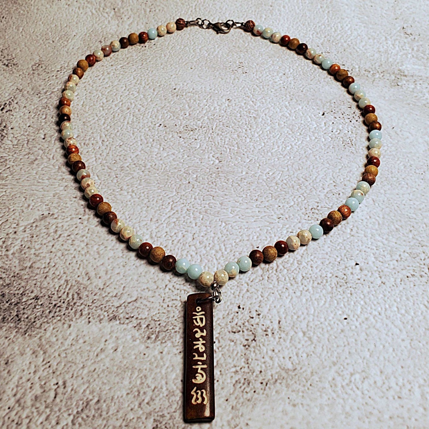 Handcrafted gemstone necklace with Aquaterra Impression Jasper beads and wood Tibetan prayer pendant