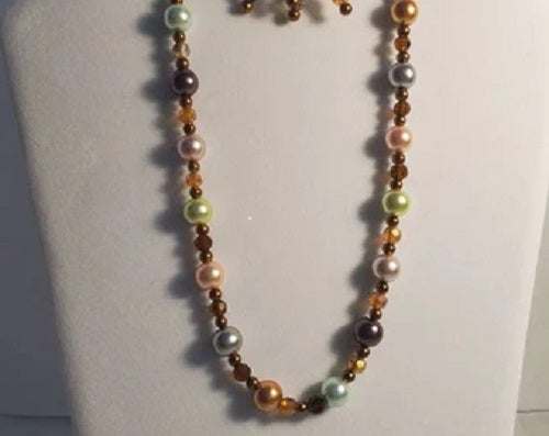 Fall pearl and crystal jewelry set with necklace, earrings, and bracelet in autumn tones