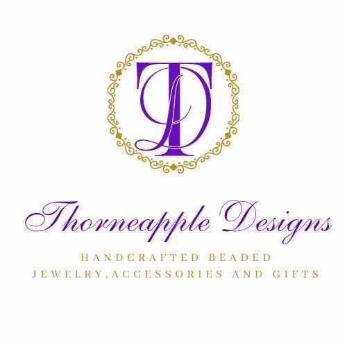 Thorneapple Designs Gift Card logo with purple and gold decorative elements for handcrafted jewelry and accessories gift options