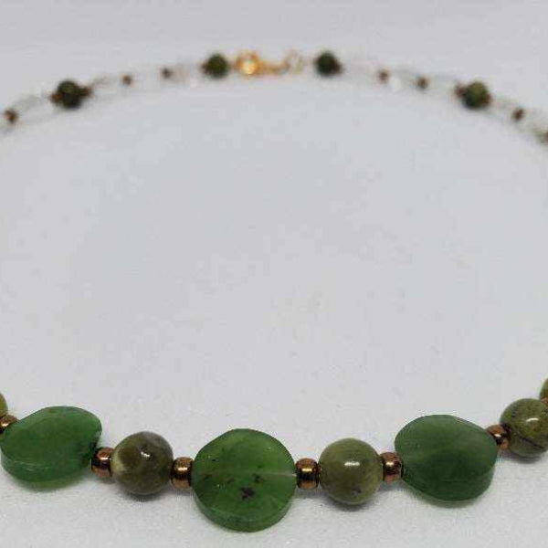 Gemstone necklace with nephrite jade, green quartz, and bronze Czech glass beads on white background