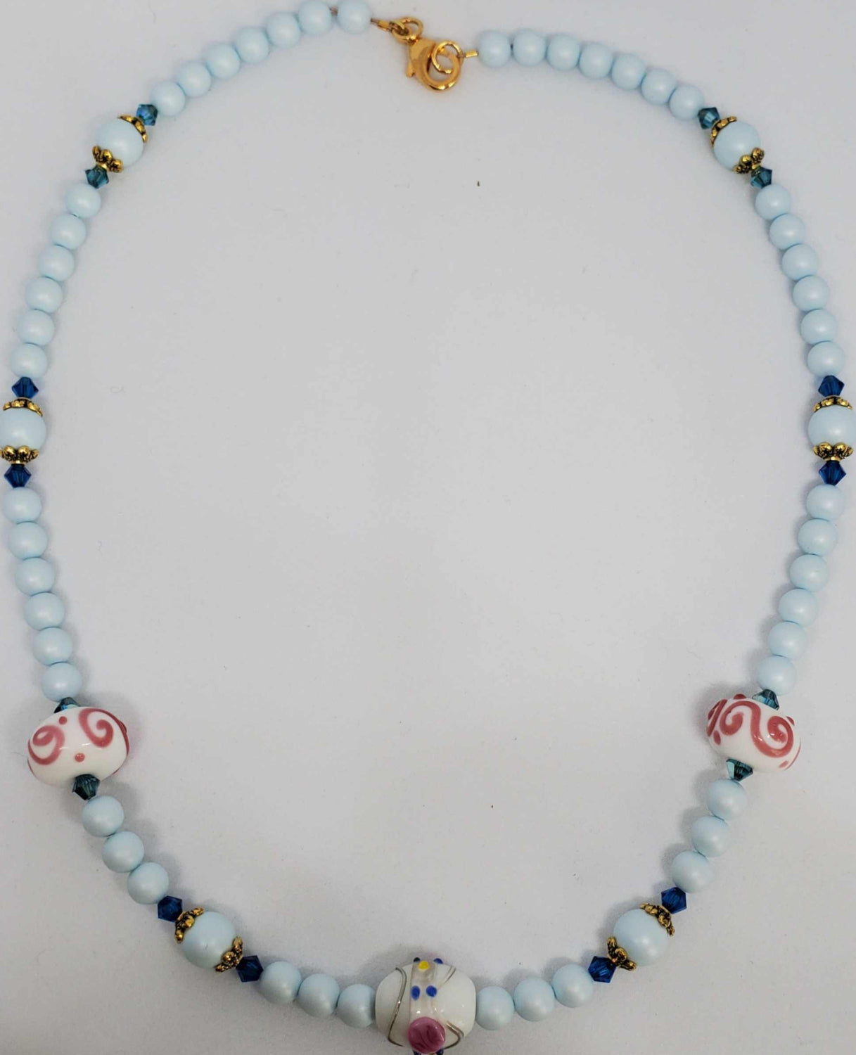 Classic Pearl Necklace with blue lampwork beads, blue Swarovski pearls, crystals, and brass clasp