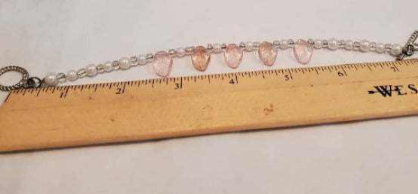 Pink and pearl necklace bracelet earring set with glass pearls and pink glass leaves shown on ruler for size reference