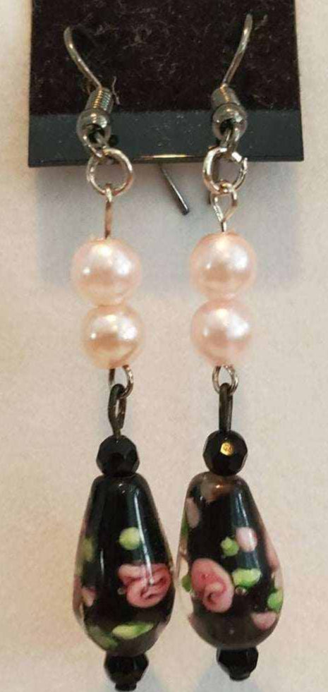 Vintage-style necklace and earring set featuring rose lampwork glass beads and pink pearls.