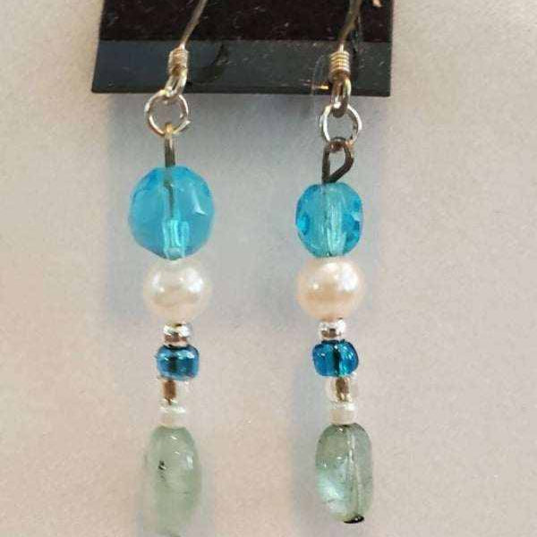Aquamarine gemstone jewelry earrings with blue glass and pearl beads in boho style