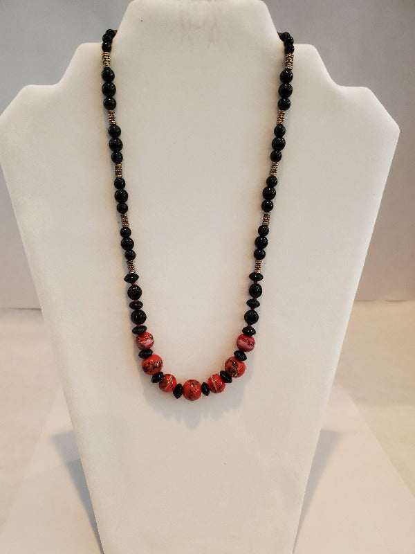 Vintage Fashion Asian inspired lampwork beaded necklace with black glass and pewter accents.