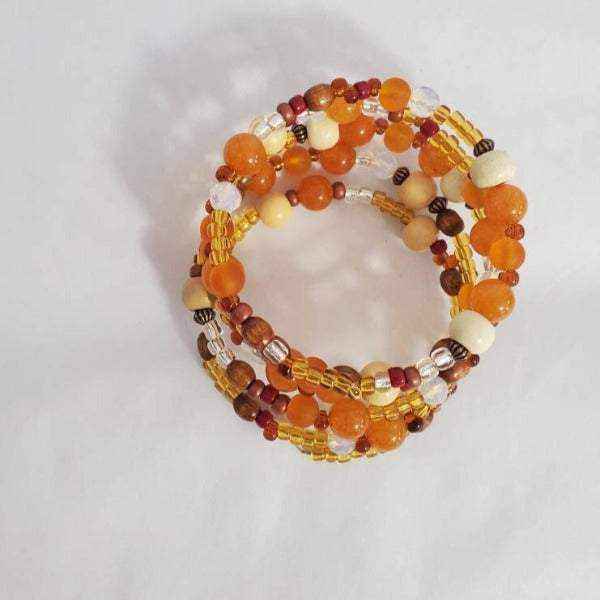 Pumpkin Pie Boho Bracelet with autumn-inspired glass, copper, crystal, wood, and gemstone beads for Fall Fashion accessory