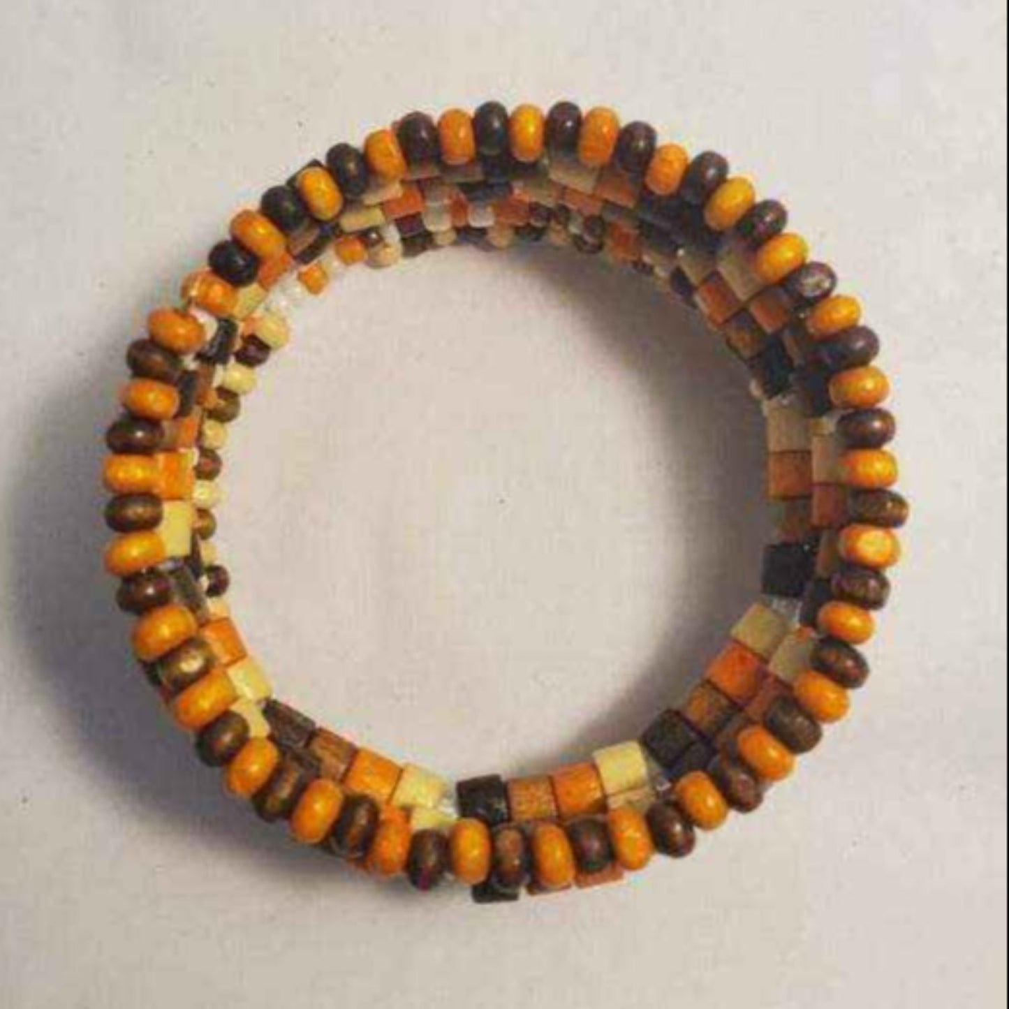Handcrafted candy corn cuff bracelet with autumn colors for fall fashion accessory
