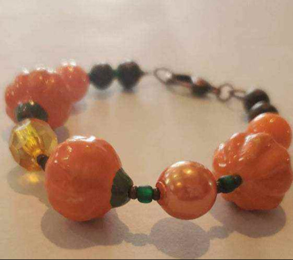 Fall fashion glass pumpkin bracelet with detailed beads and copper clasp for autumn style