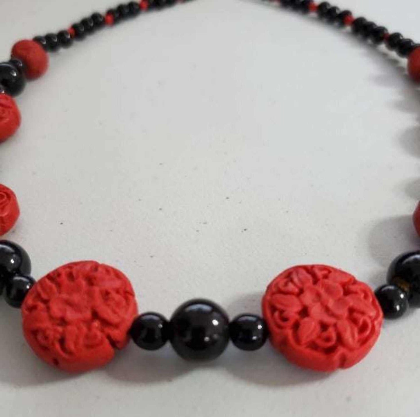 Handcrafted vintage style black and red floral clay necklace with glass and resin beads