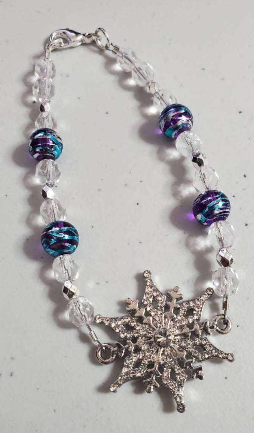 Holiday Bracelet with silver rhinestone snowflake and glass crystal beads
