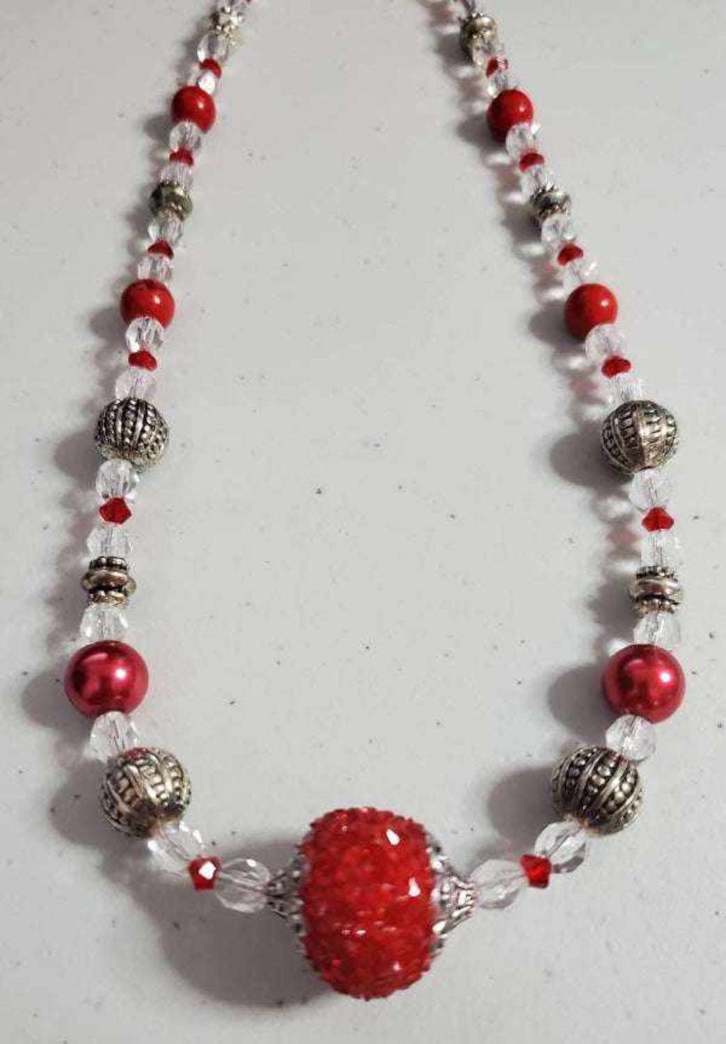 Vintage Style Red Dazzle Necklace with red rhinestone, Swarovski crystals, pewter accents, and red howlite beads