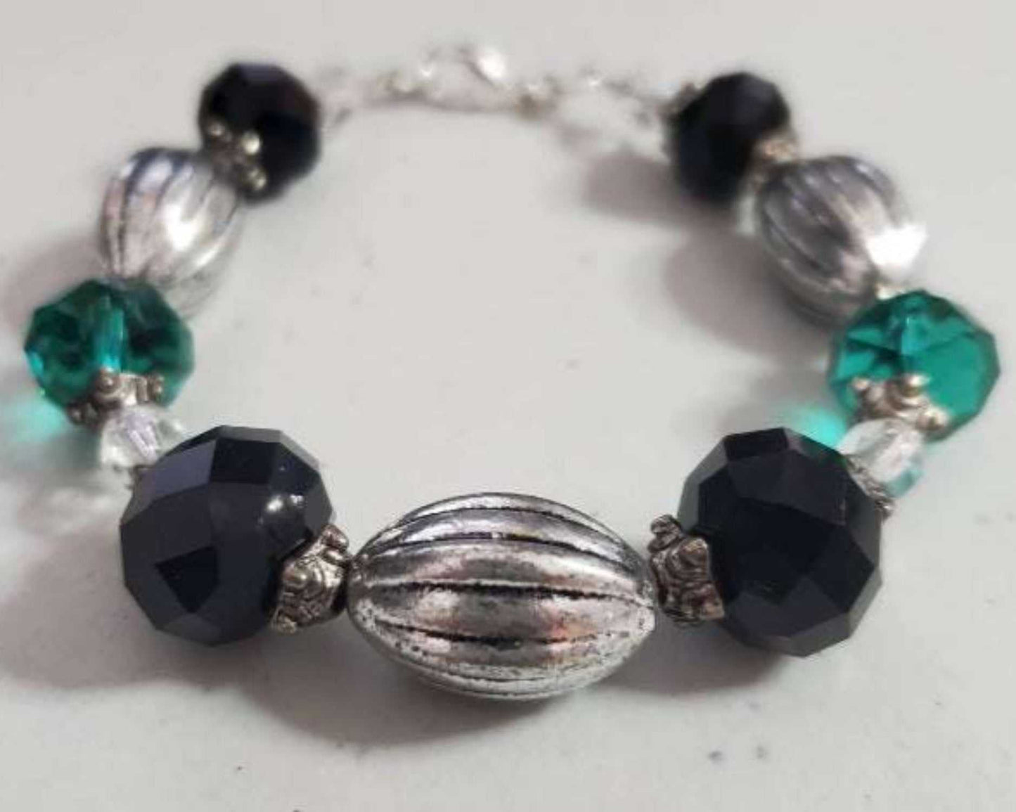 Vintage Fashion Teal and Black Bracelet with faceted glass beads, pewter accents, and lobster claw clasp.