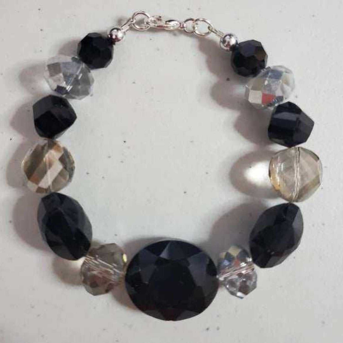 Vintage style crystal black and gray glass bead bracelet with pewter accents and lobster clasp