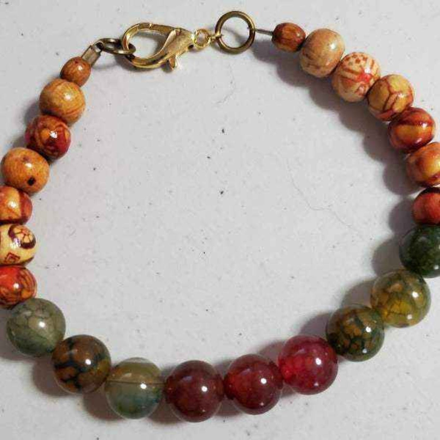Men's gemstone bracelet with semiprecious Tiger’s Eye, Jasper, Quartz, Agate, wood beads, and copper clasp