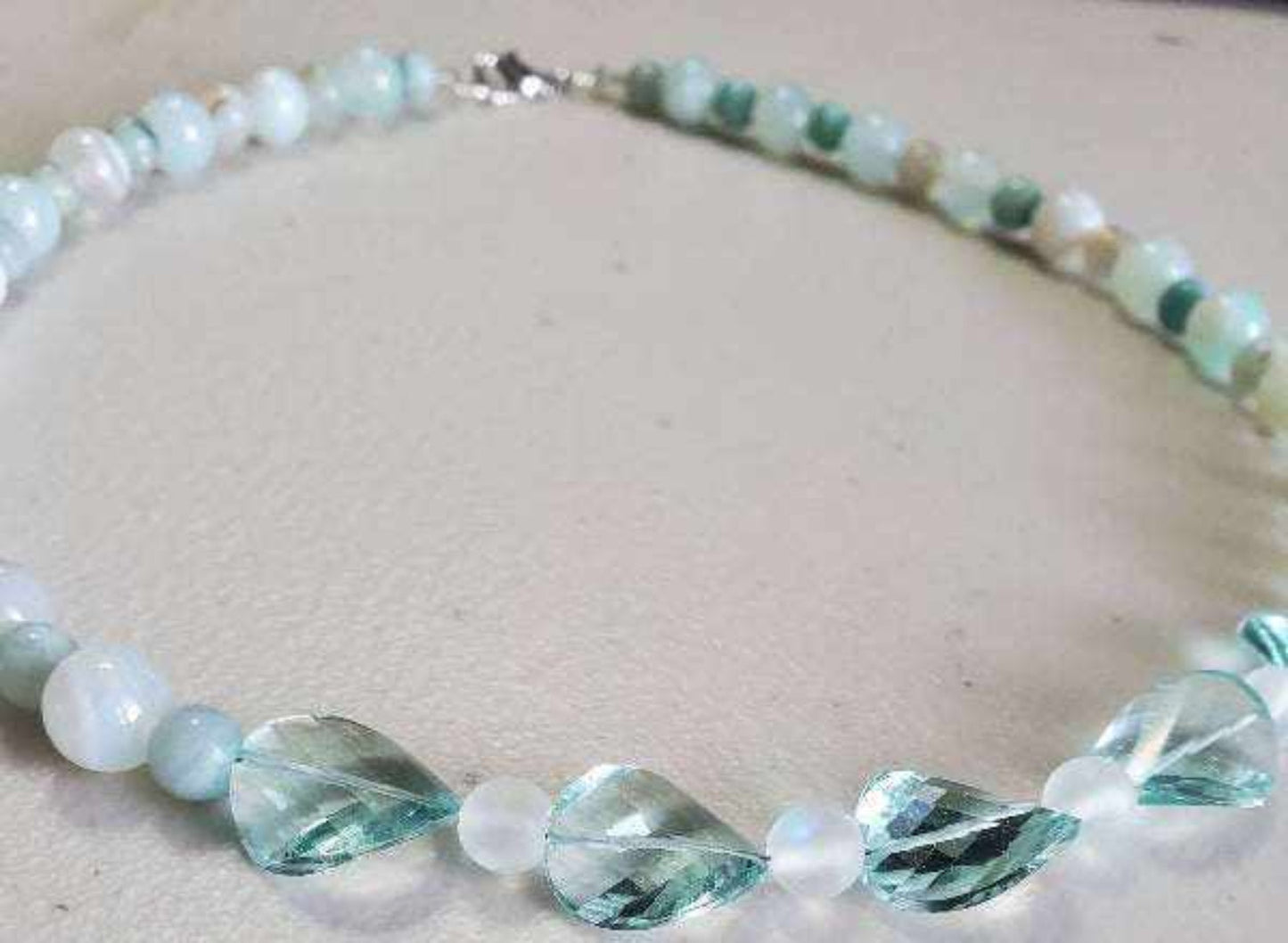 Faceted aquamarine and amazonite gemstone necklace with lobster claw clasp, 16 inches length, elegant and tranquil design