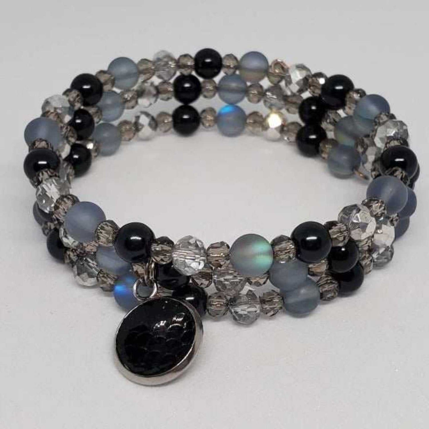 Crystal Aura Mermaid Charm Bracelet with iridescent glass beads, glass pearls, Austrian crystals, and mermaid scale charm on memory wire