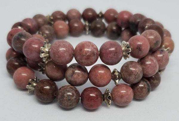 Handcrafted Rhodonite gemstone bracelet with pewter spacer beads on flexible memory wire cuff design