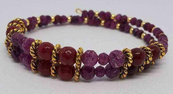 Handcrafted ruby gemstone bracelet with 4mm red beads and brass spacers on flexible memory wire cuff design