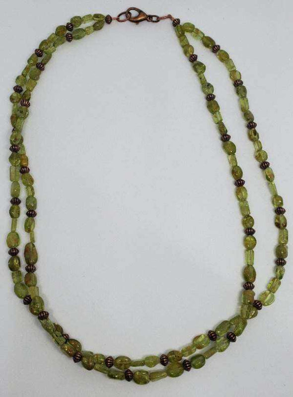 Handcrafted peridot double strand gemstone necklace with copper spacers and lobster claw clasp