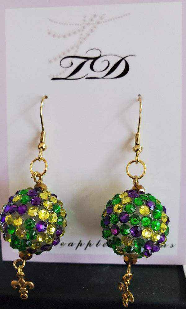 Colorful Mardi Gras earrings with green, purple, and gold gumball beads and Fleur-de-lis charms on gold hooks