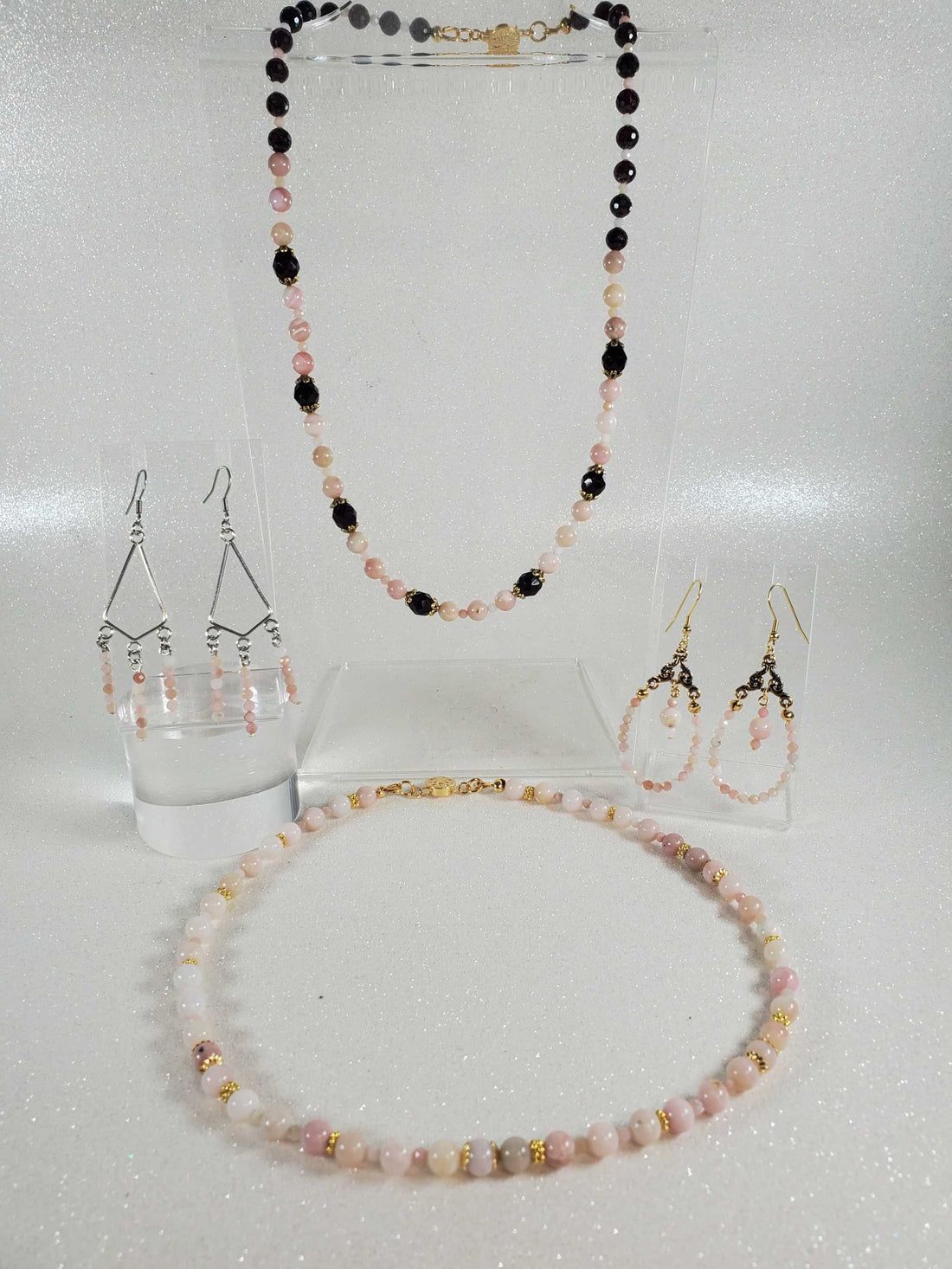 October birthstone jewelry set featuring pink tourmaline and black beads necklace with matching earrings