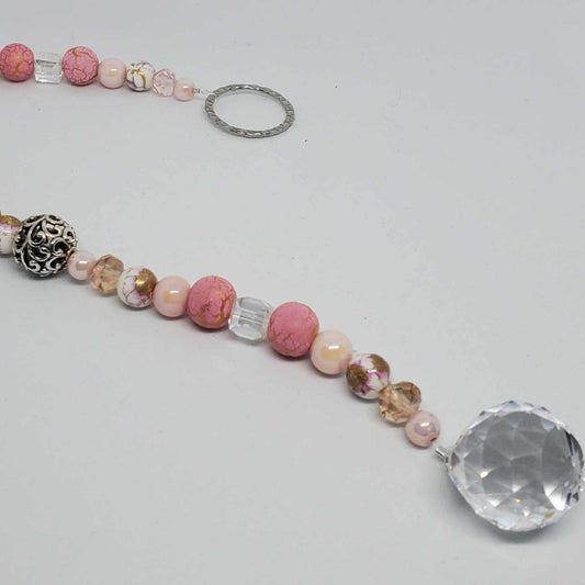 Crystal Suncatcher with pink marble beads, gold accents, pearls, and a clear teardrop prism crystal.