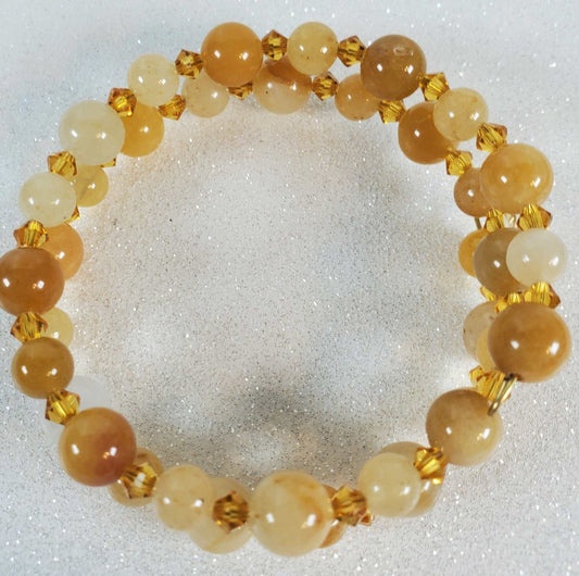 Yellow Jade gemstone bracelet with crystal accents on adjustable memory wire cuff