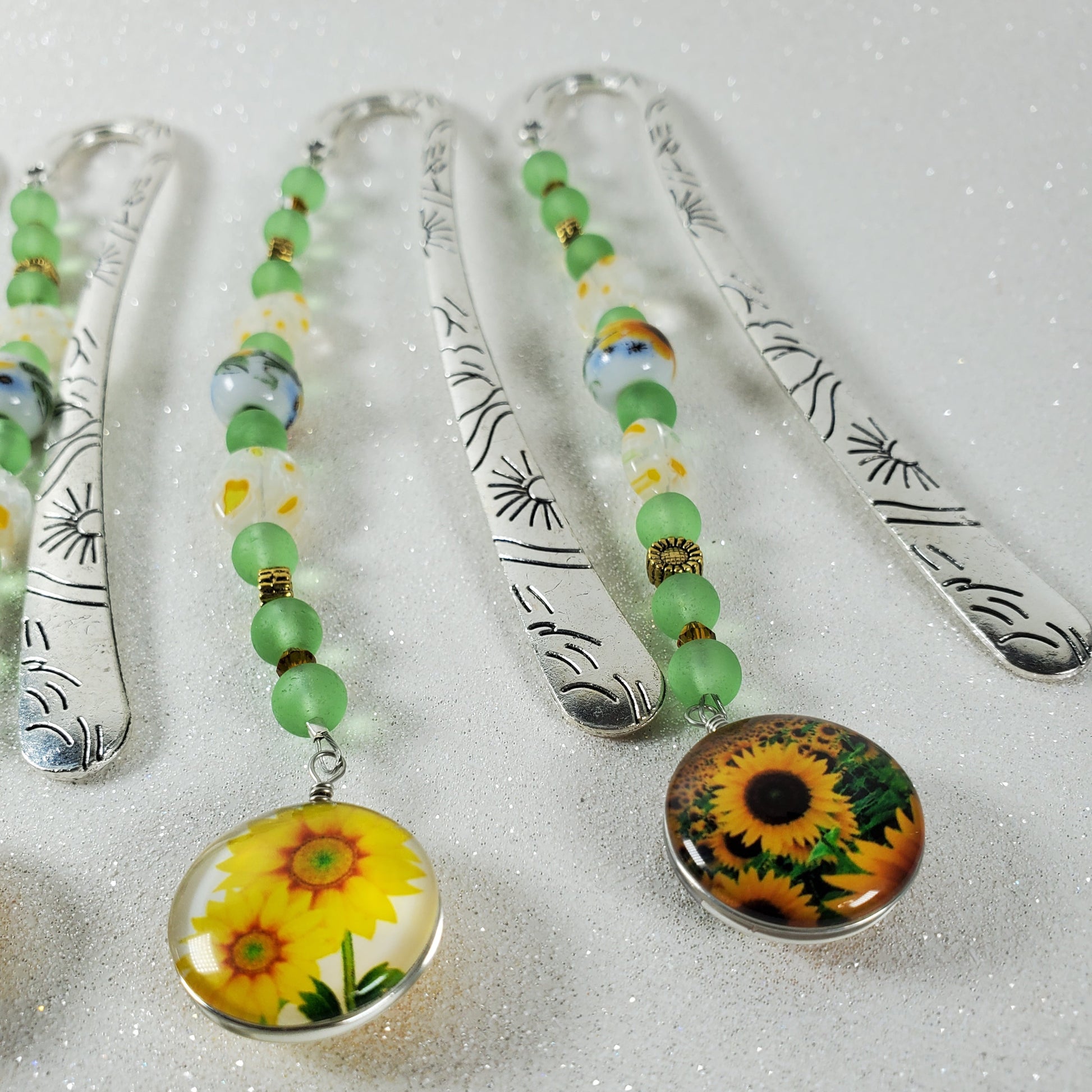 Decorative bookmark with floral designs on a textured white background