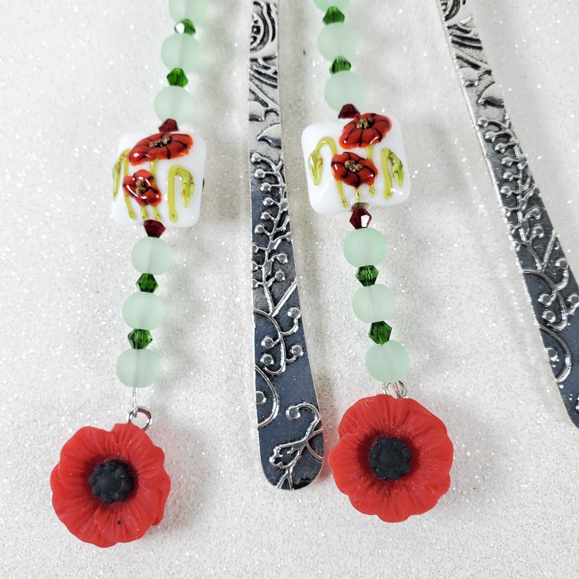 Decorative bookmarks with floral designs on a white background