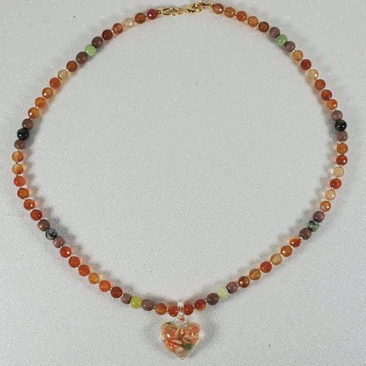 Beaded necklace on a white surface