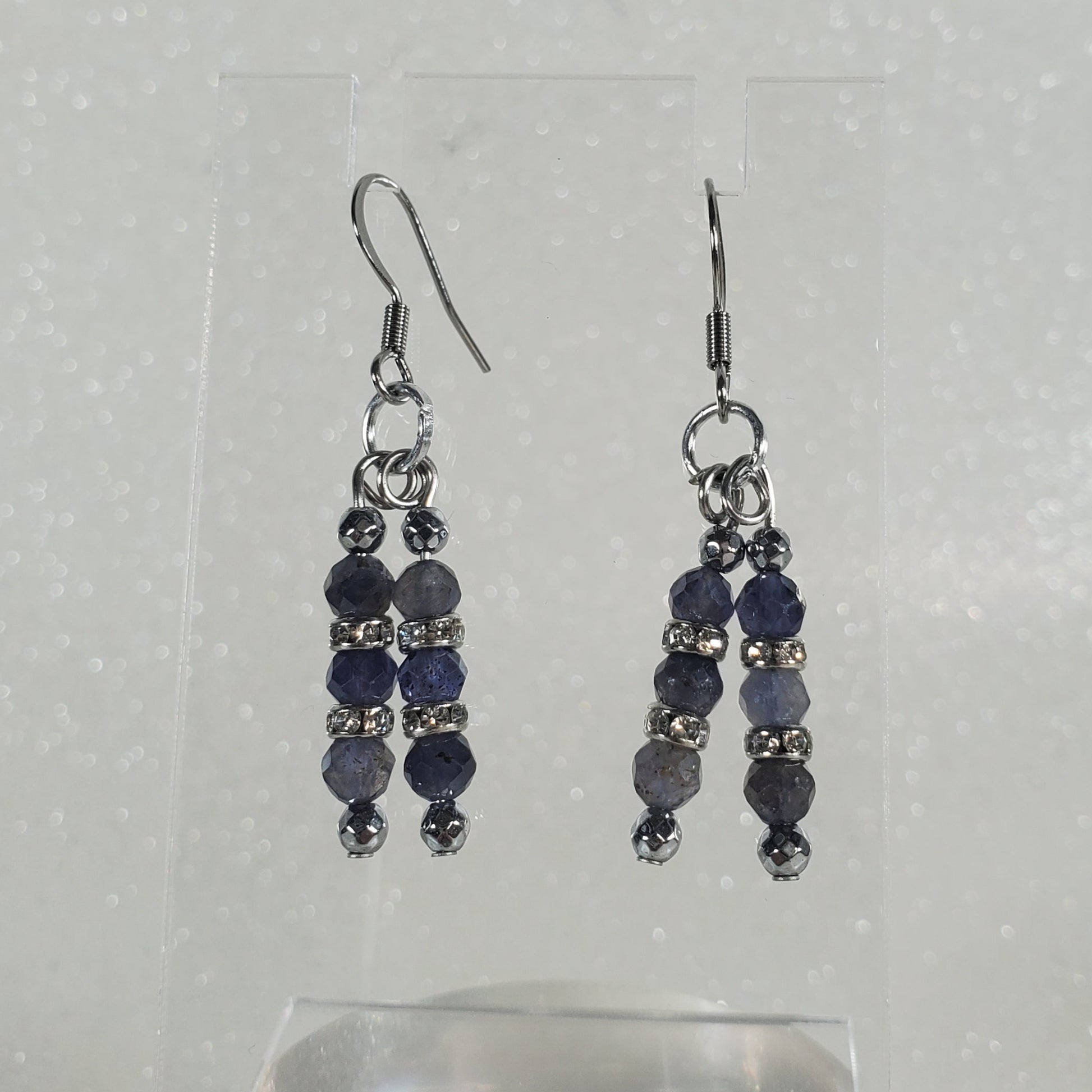 Pair of beaded earrings on a white background