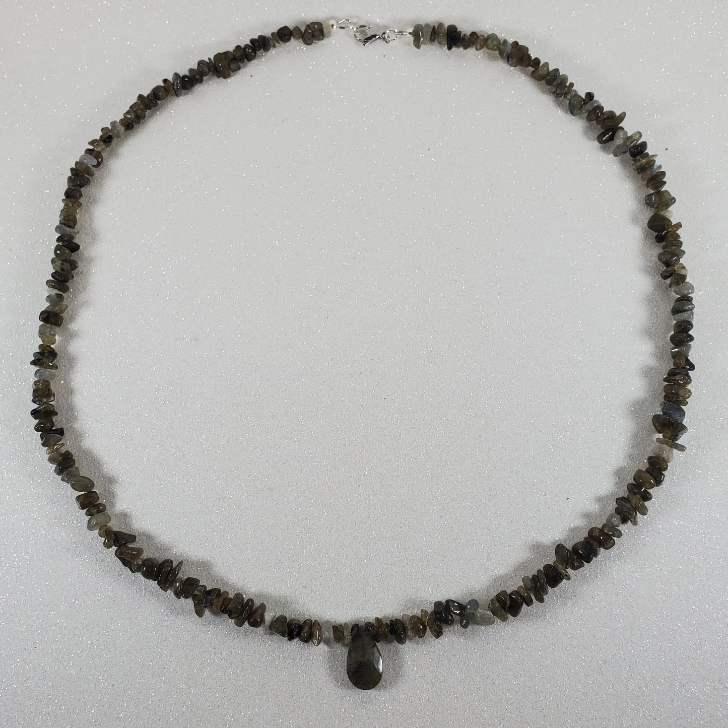 Necklace with small beads on a white background