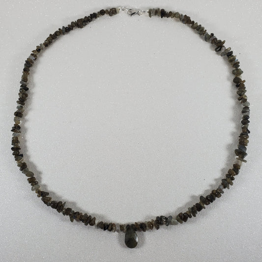 Necklace with small beads on a white background