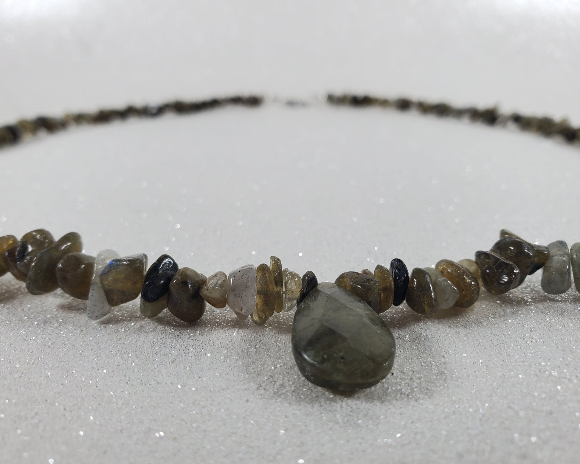 Necklace with stone beads on a white background