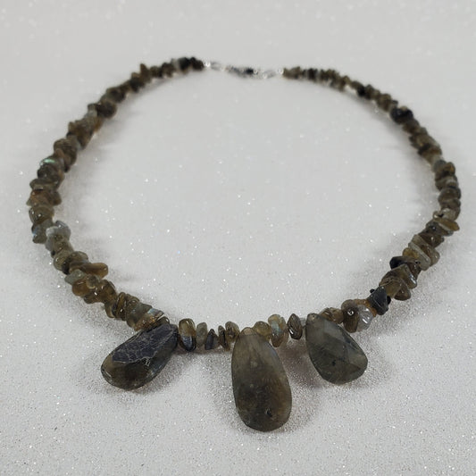 Necklace with stone beads on a white background